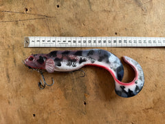 Filet de pêche à mailles nouées appâté